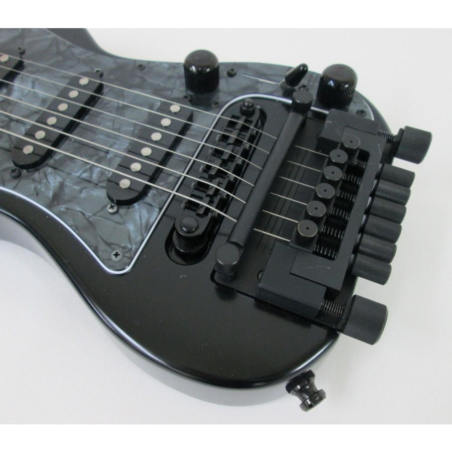 Long-scale portable electric guitar